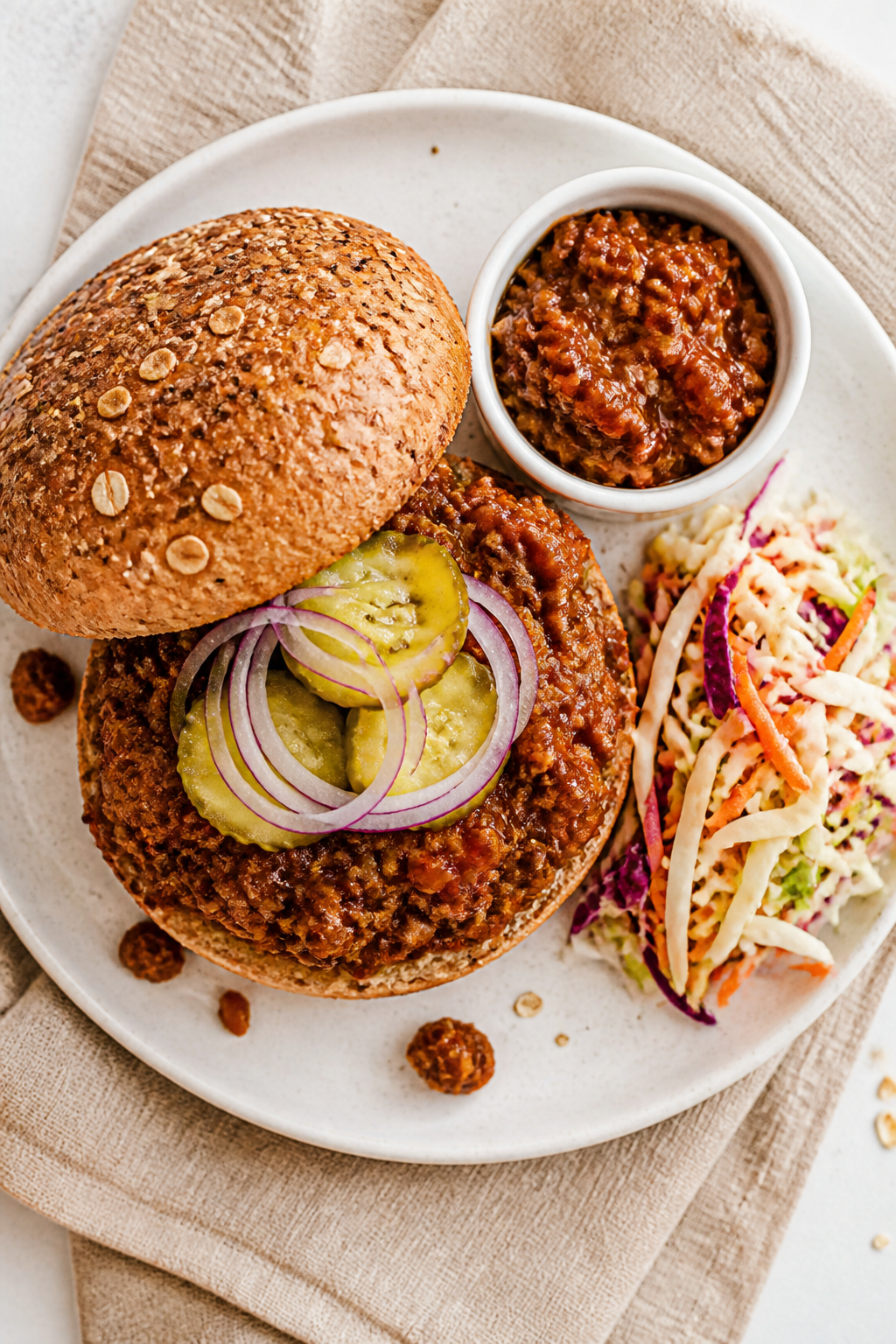 Final plated, tasty top view: Overhead shot of a Healthy Sloppy Joe Sandwich piled high on a lightly