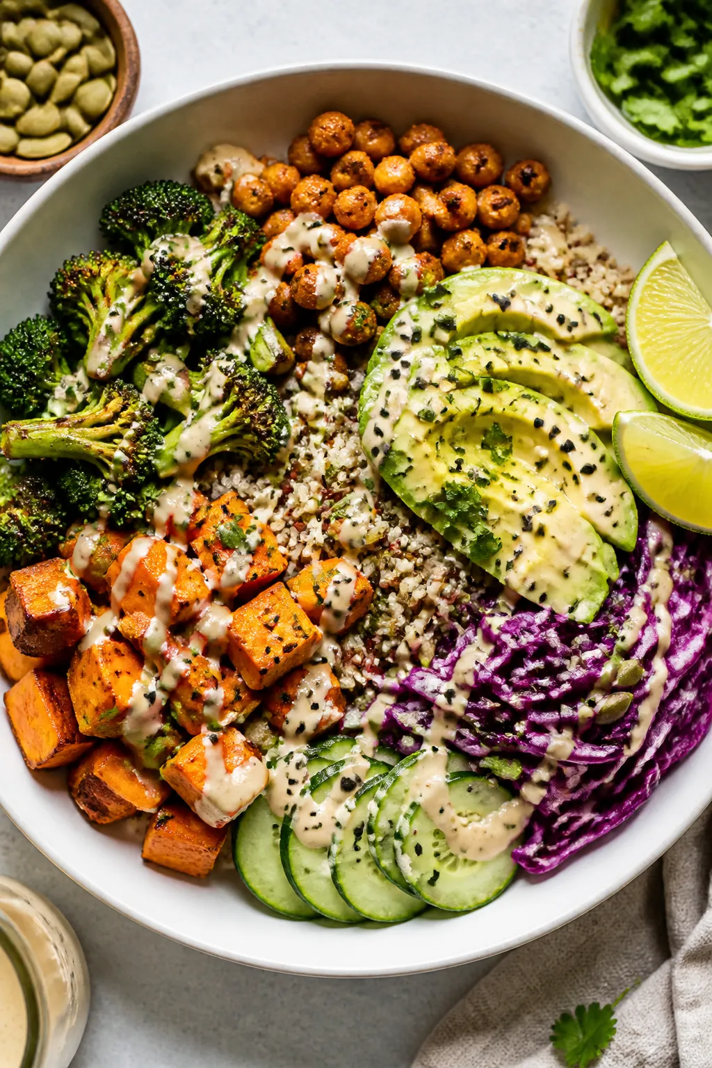 Final plated overhead: Vibrant Vegetarian Vegan Buddha Bowl arranged artfully in a wide matte-white 